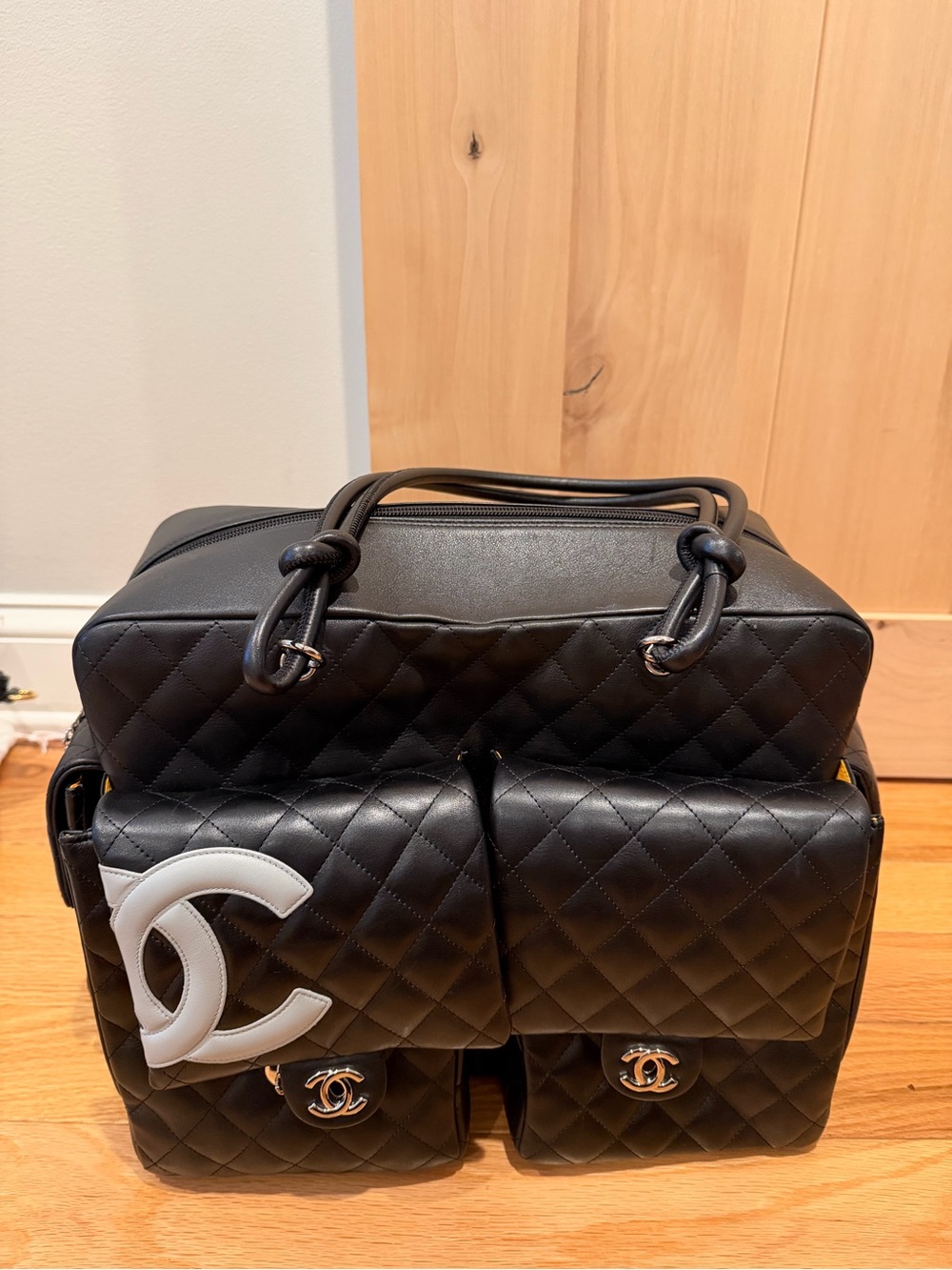 CHANEL Black Quilted Leather Backpack with Front Pockets